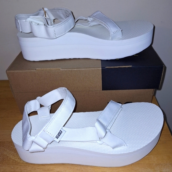 A pair of Teva W. Flatform Universal sandals in solid white in a ladies Size 9. - Picture 1 of 10
